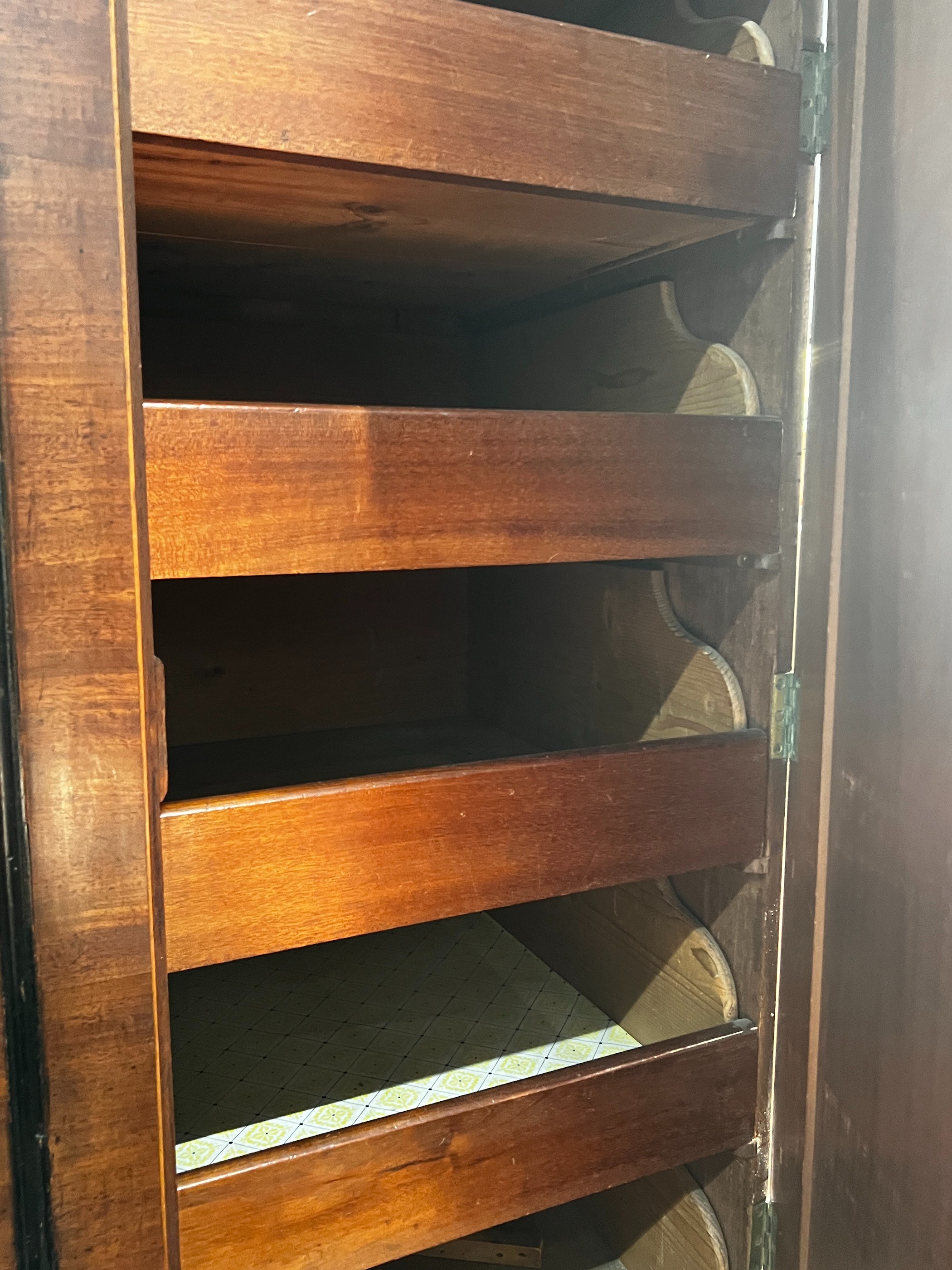 An early 20th century Regency style narrow mahogany linen press, width 92cm, depth 54cm, height 220cm